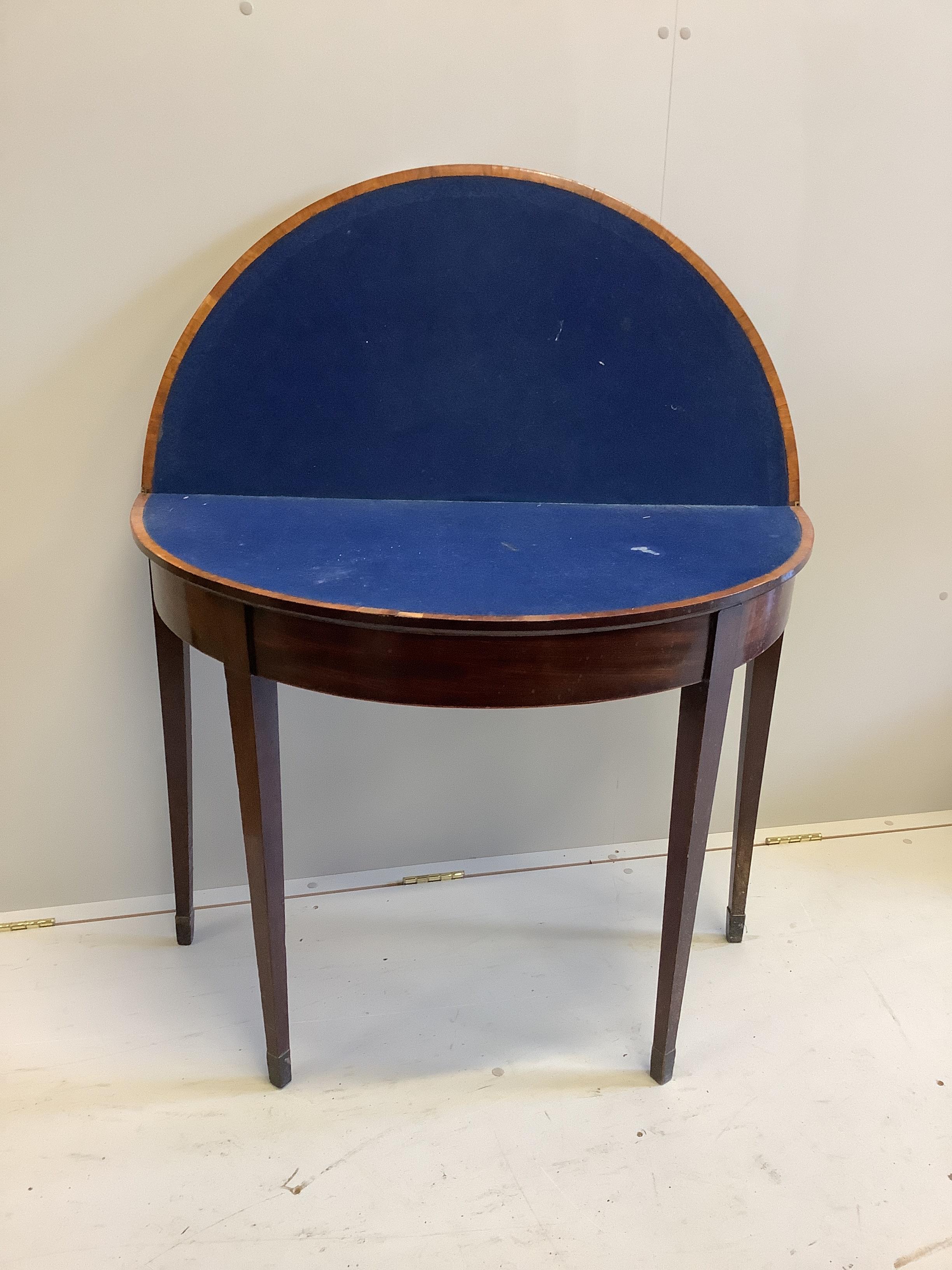 A George III mahogany D shaped folding card table, width 91cm, depth 45cm, height 74cm
